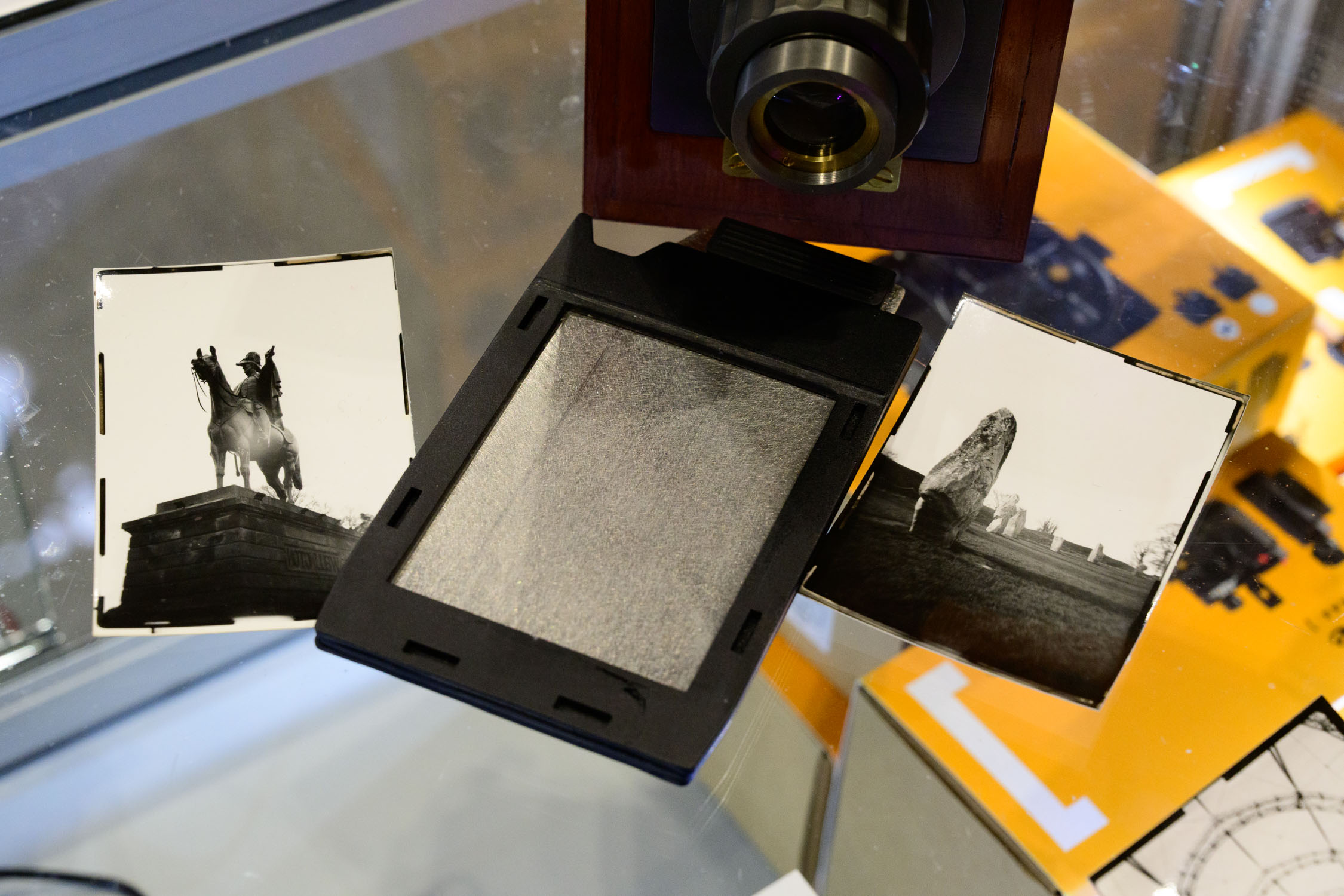 The darkslide, developing film back and two black-and-white prints from the [ B O X X ] camera prototype